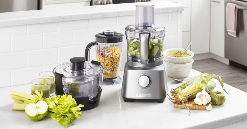 Cuisinart food processor, blender, and juice extractor on kitchen counter