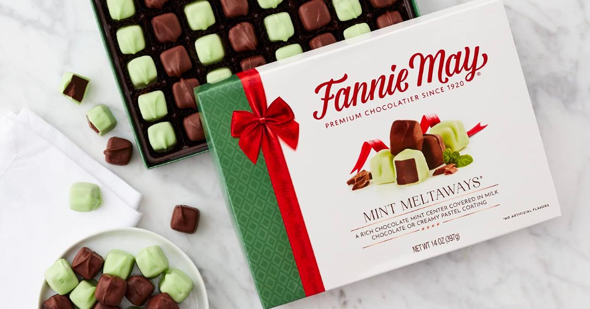 fannie may mint meltaways open box with candies next to a bowl of mint meltaways