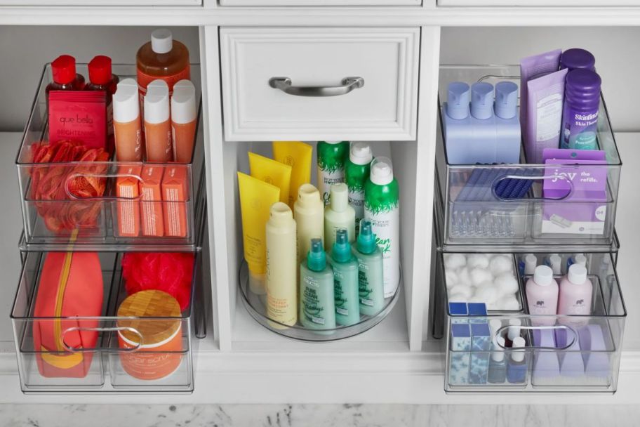 The Home Edit 17 Piece Bath Edit, Clear Plastic Modular Storage System shown in use in a bathroom