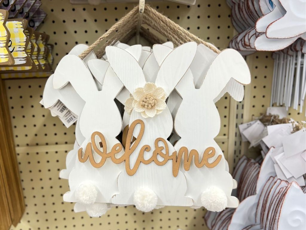 wooden Easter sign with 3 white bunnies with cottontails that says Welonlinee