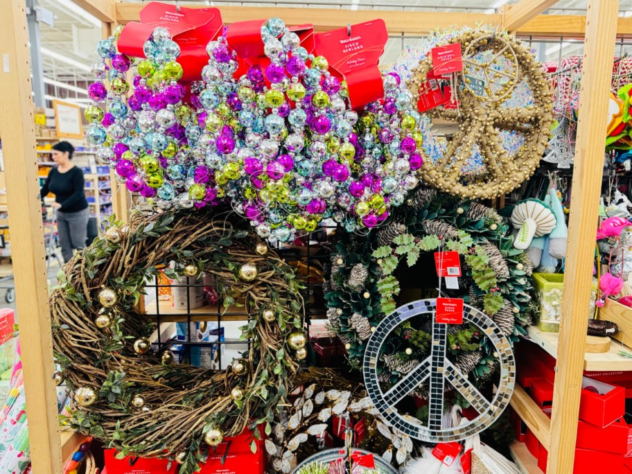 Holiday wreaths displayed on a wall