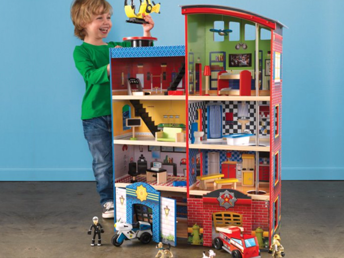 boy playing with KidKraft Hometown Heroes Play Set