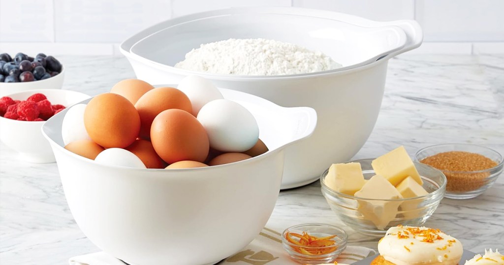 white kitchenaid mixing bowls set on counter