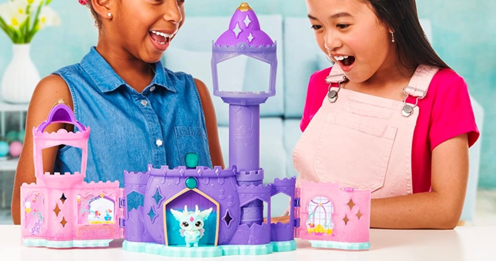 girls playing with Magic Mixies Mixlings Magic Castle Set