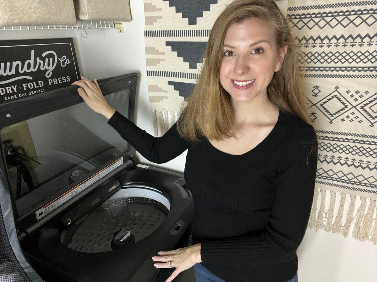 Woman opening washer