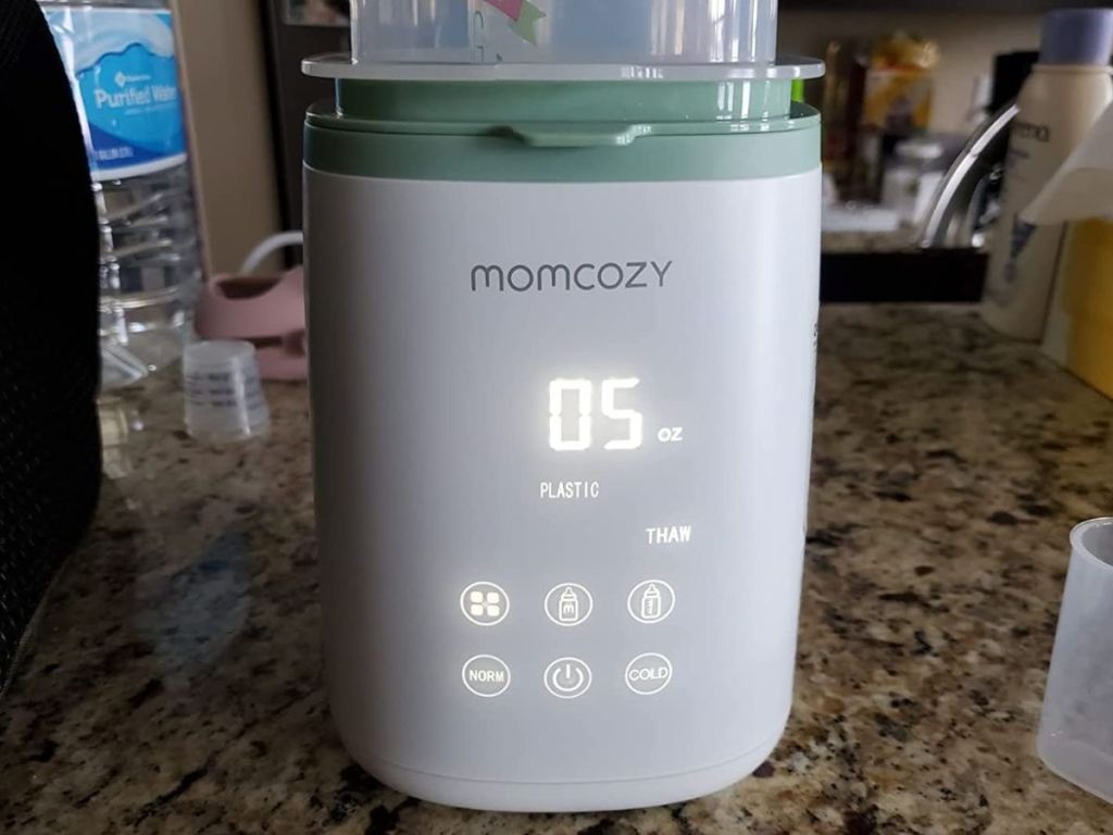 Close up of setting on the Momcozy Bottle Warmer