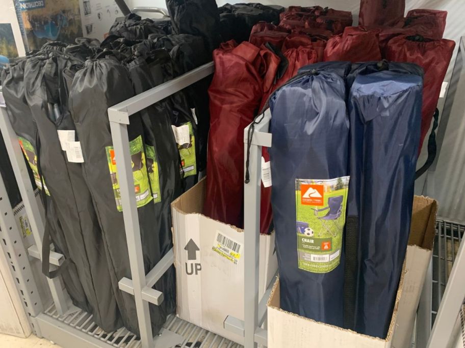 Boxes of Ozark Trail Camping Chairs in storage bags at Walmart