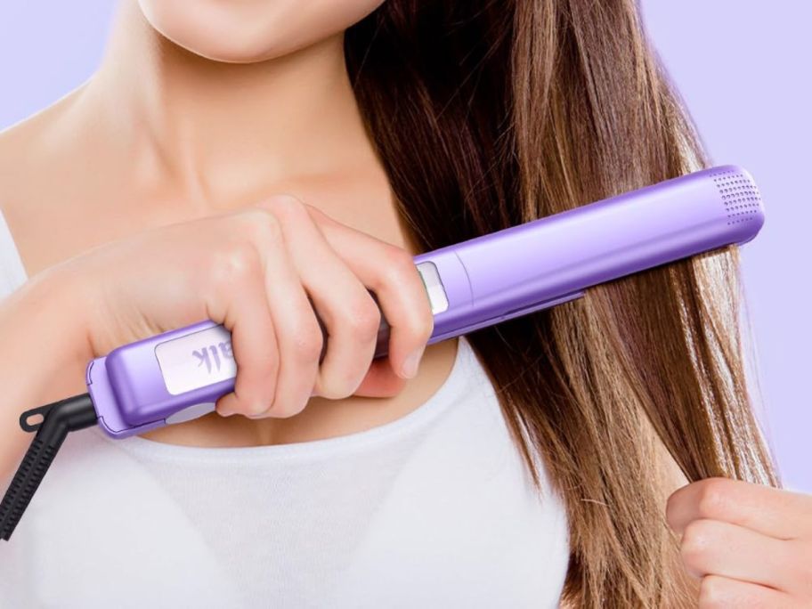 woman using Wavytalk Salon Flat Iron Hair Straightener on hair