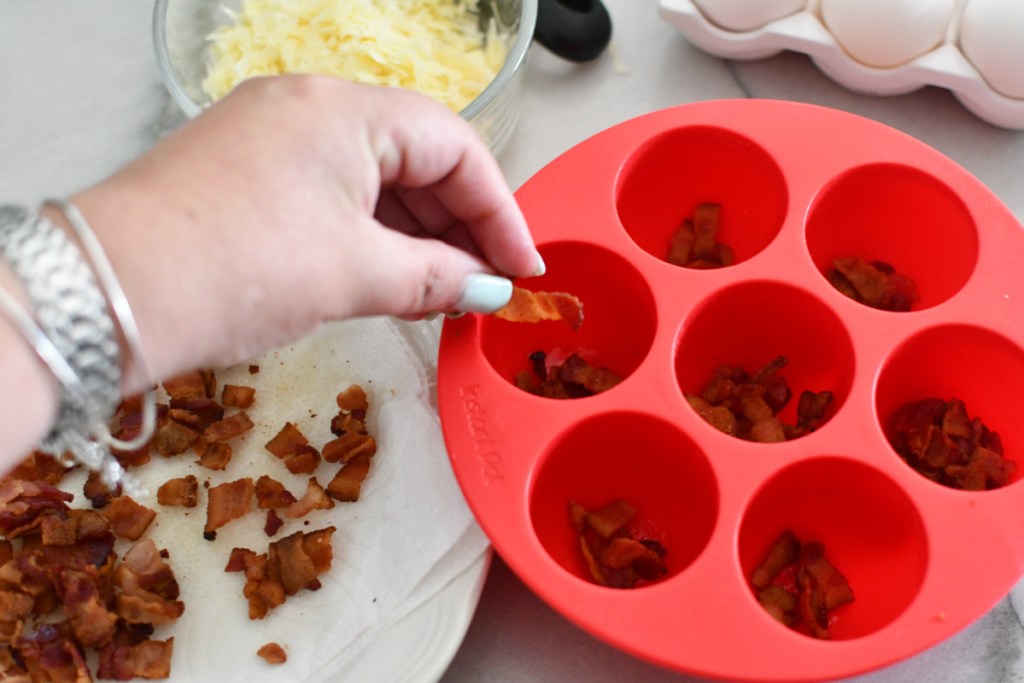 adding bacon to egg bites mold