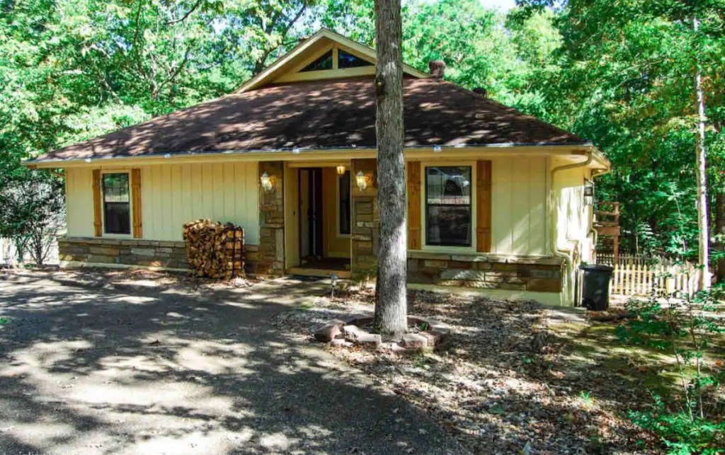 yellow house in the woods