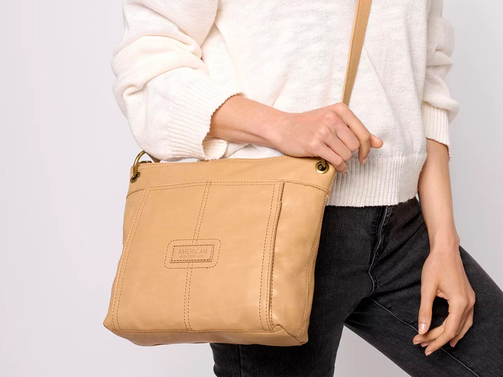 woman wearing american leather onlinepany purse