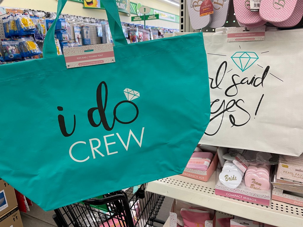 hand holding i do crew tote