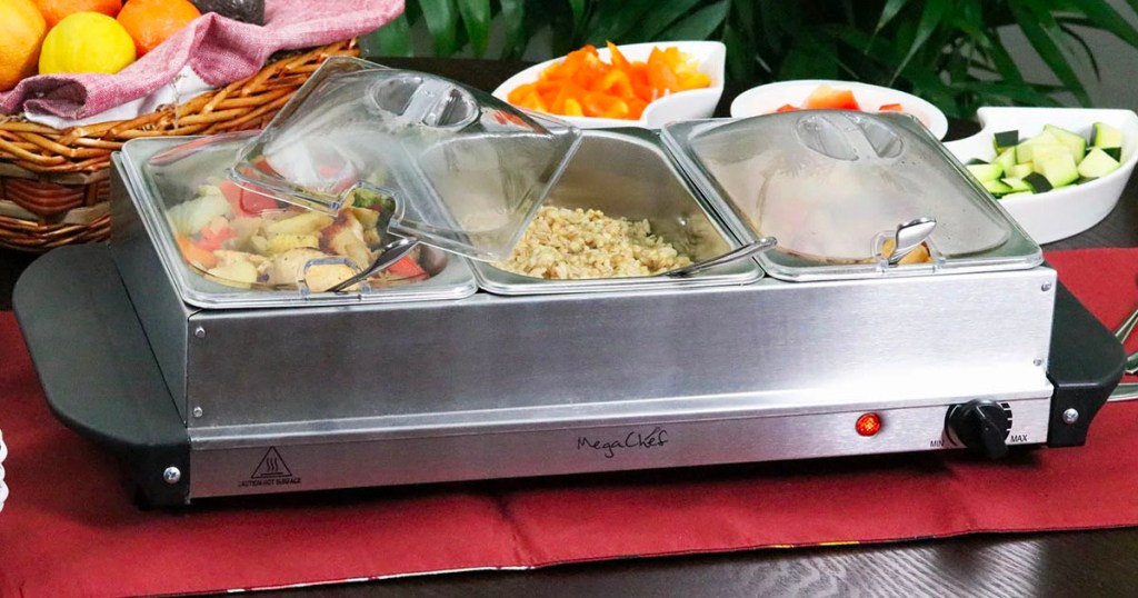 megachef buffet 3 section food warmer full of food on table