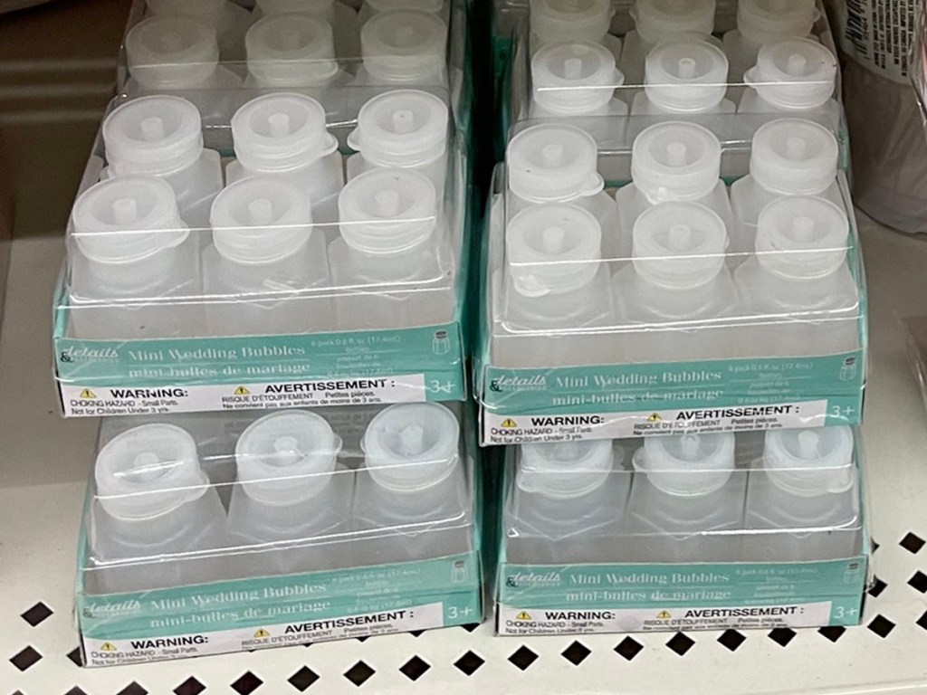 mini wedding bubble packs stacked on shelf in dollar tree