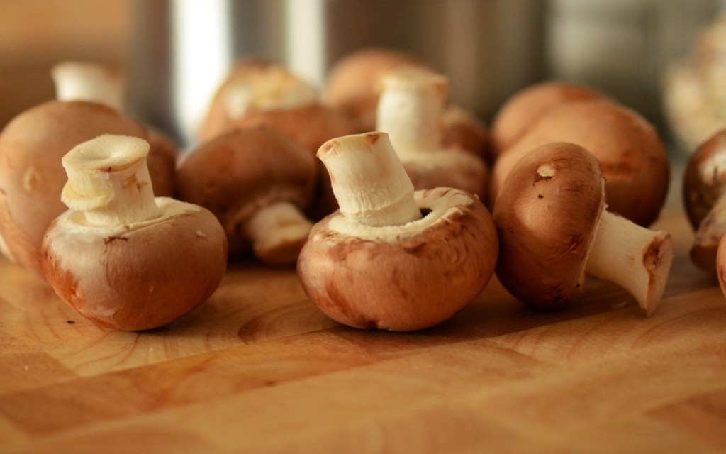 mushrooms on cutting board