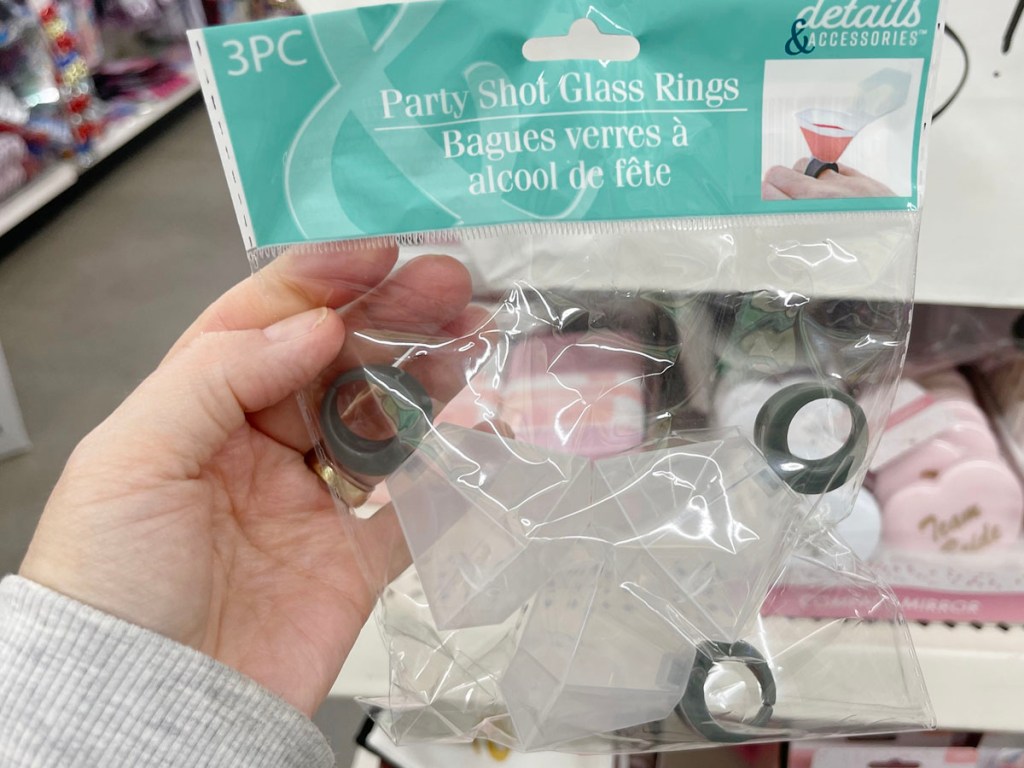 hand holding bag of shot glass rings