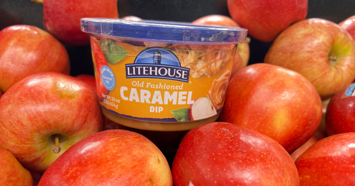 Lighthouse Caramel Apple Dip surrounded by red apples