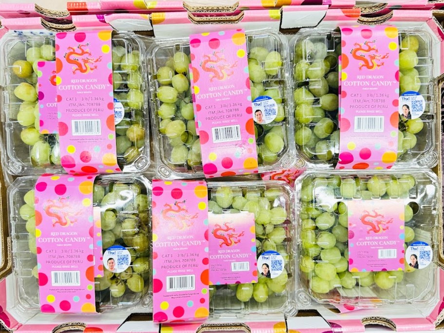 large containers of Cotton Candy Grapes on store display