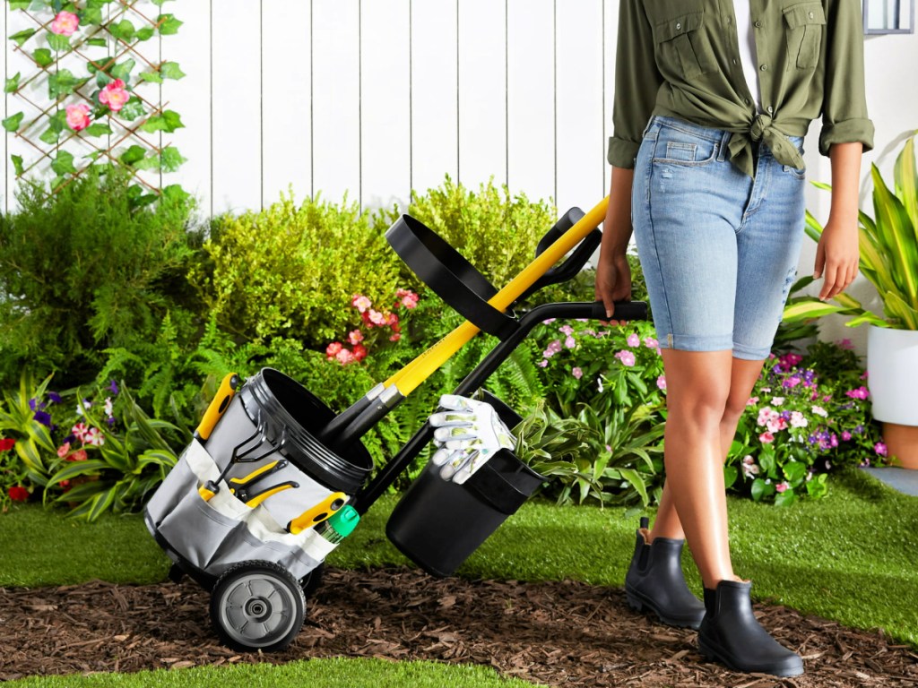 woman pulling an Expert Gardener Landscaping Steel Tool Caddy with Wheels