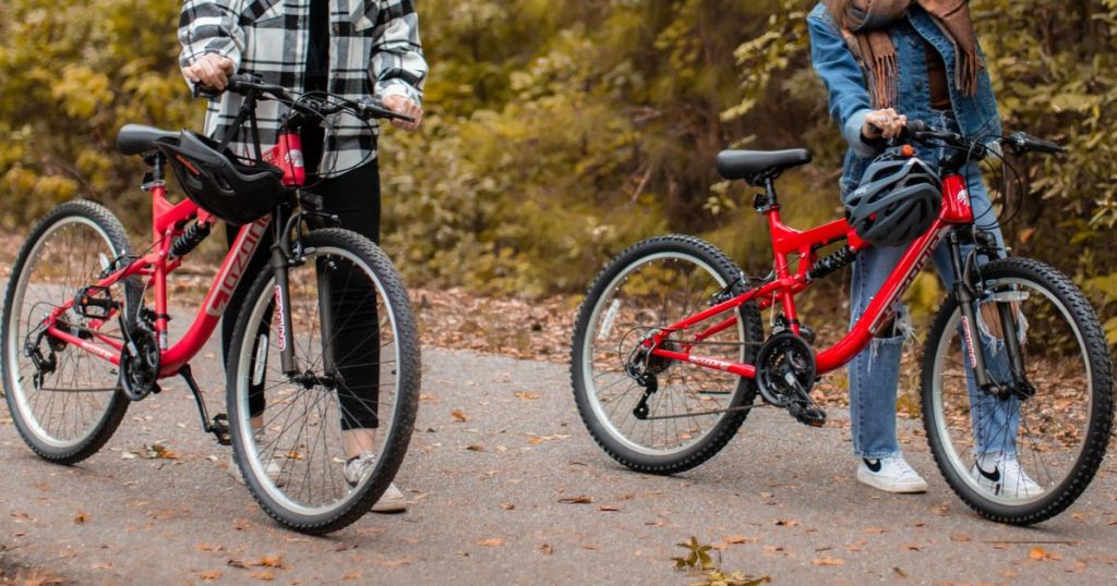 women walking on trail with Ozone Exhilarate mountain bikes