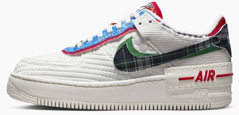 white nike sneaker with patchwork details