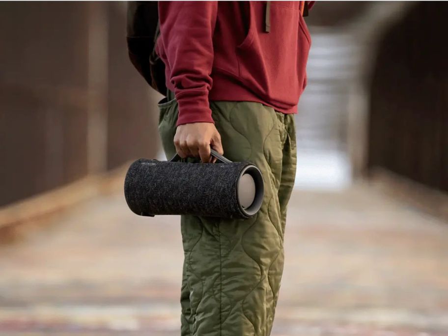 Man holding a XG300 Mega Bass Portable Bluetooth Wireless Speaker