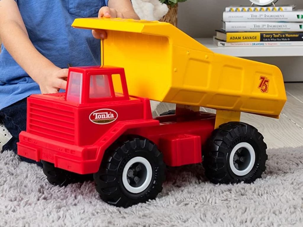 A red and yellow dump truck 