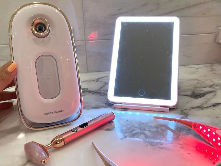 Vanity Planet Mirror and mister 