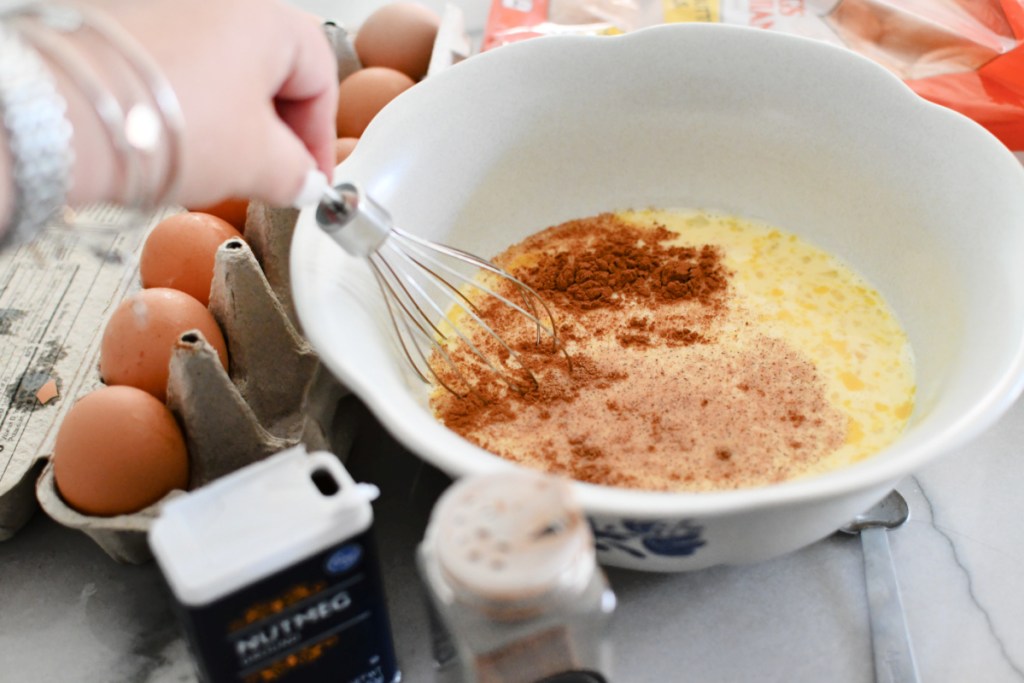 adding cinnamon and nutmeg into french toast