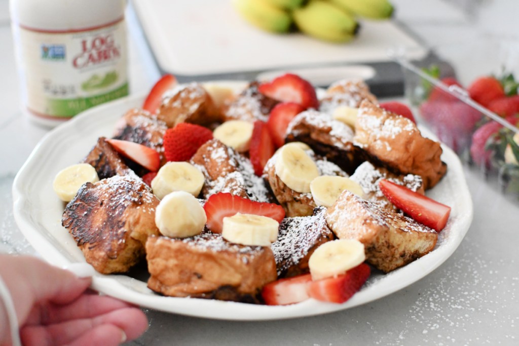 adding fruit to french toast