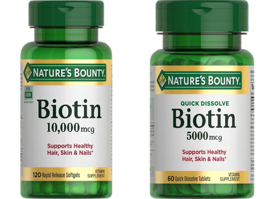 two nature's bounty biotin bottle stock images