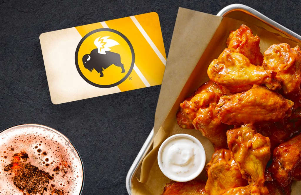 buffalo wild wings gift card next to tray of wings and drink