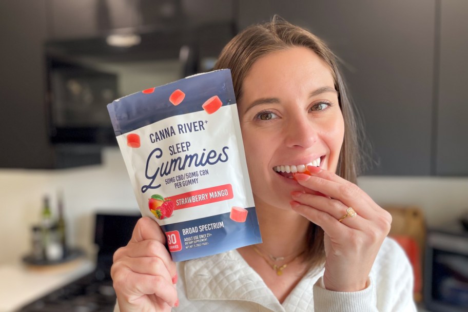 woman eating cbd gummy