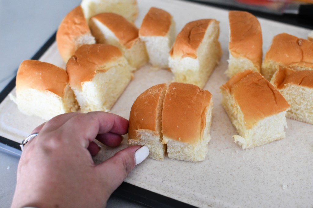 cutting hawaiian rolls in half