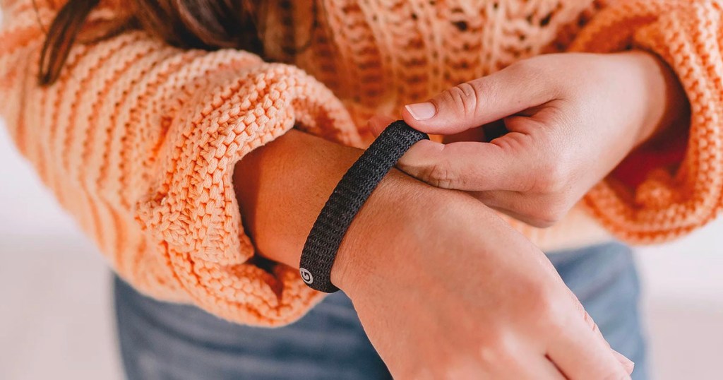 black hair tie on womens wrist