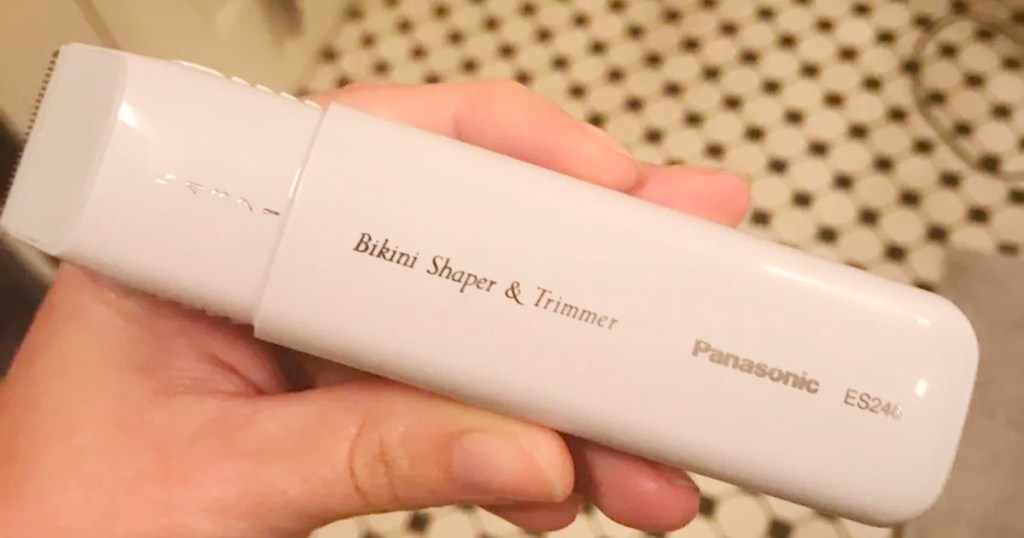 hand holding panasonic bikini trimmer