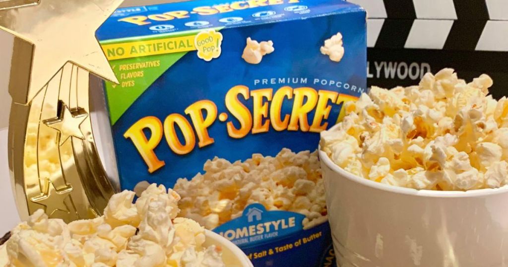 box of pop secret homestyle flavor next to 2 bowls of popcorn