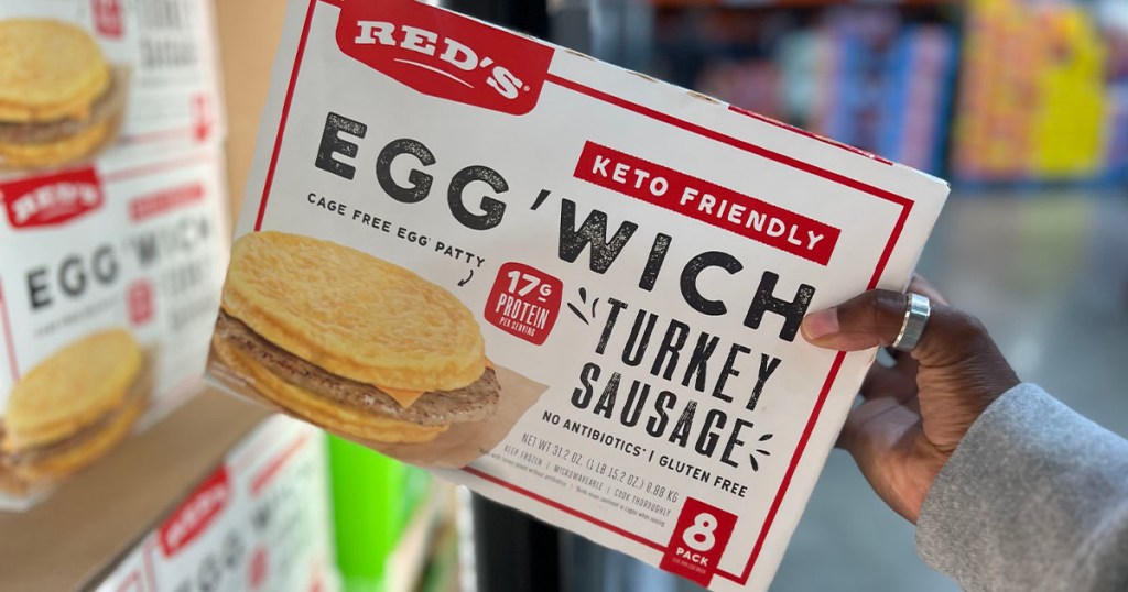 hand holding for reds egg wich box