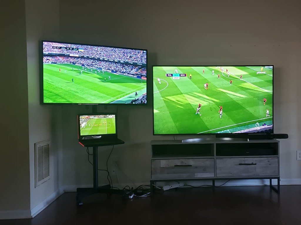 tv stand displayed next to a regular tv stand