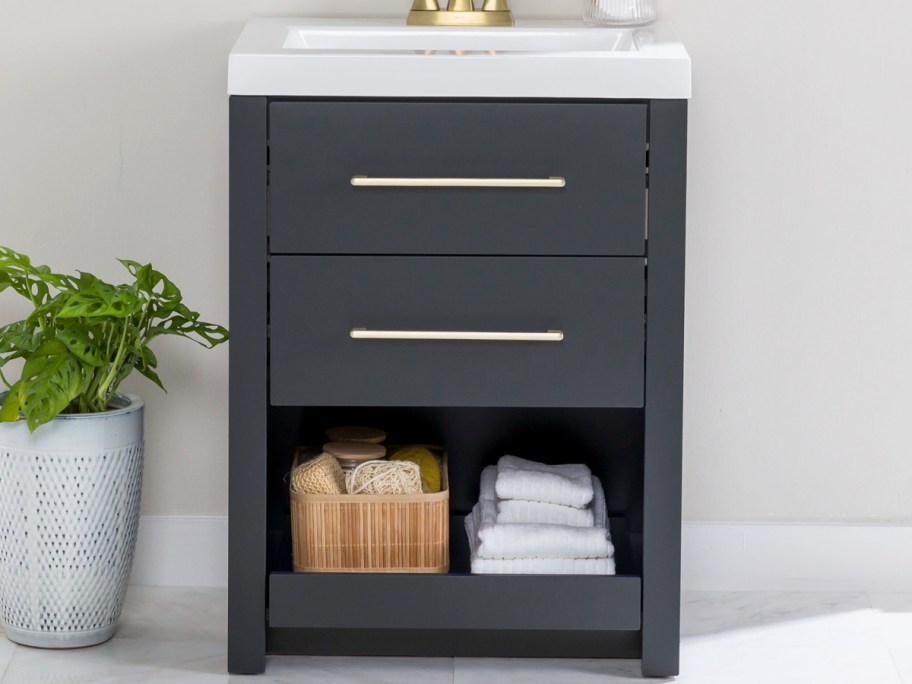 black bathroom vanity with white top