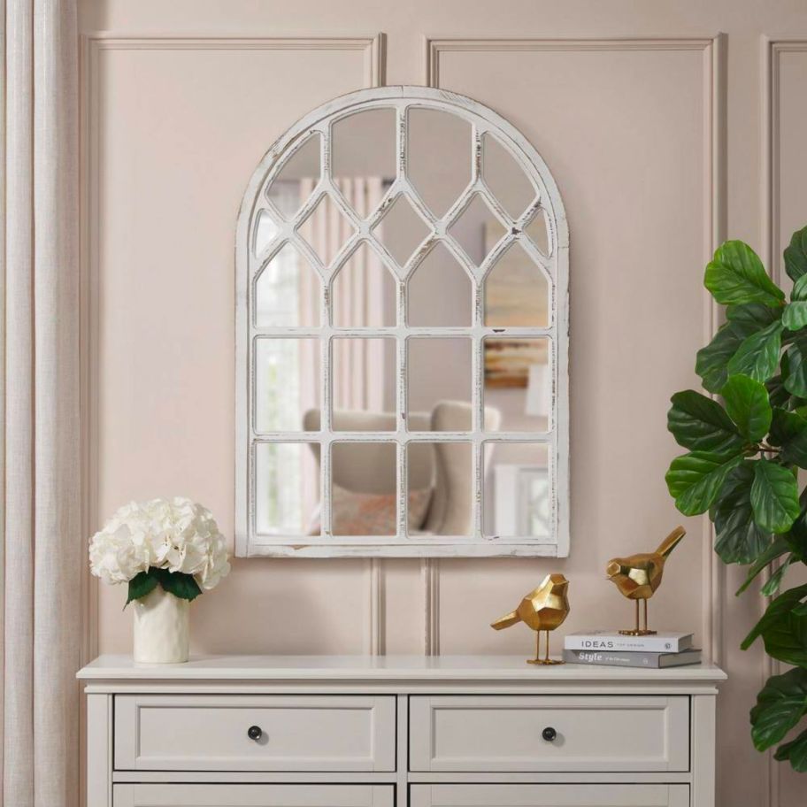 white windowpane arched mirror on wall