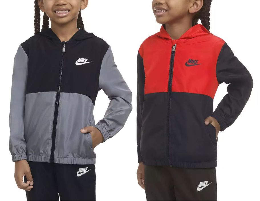 two little boys wearing nike wind jackets