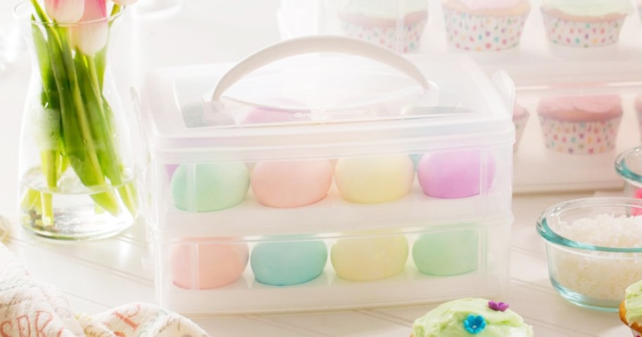 colorful eggs inside a carrier storage container on table