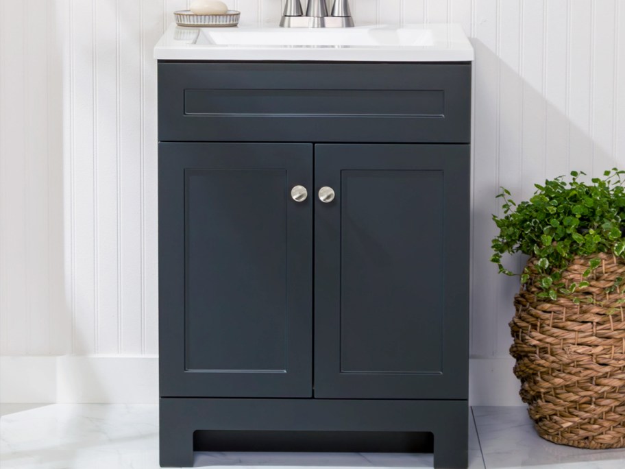 black bathroom vanity with white top