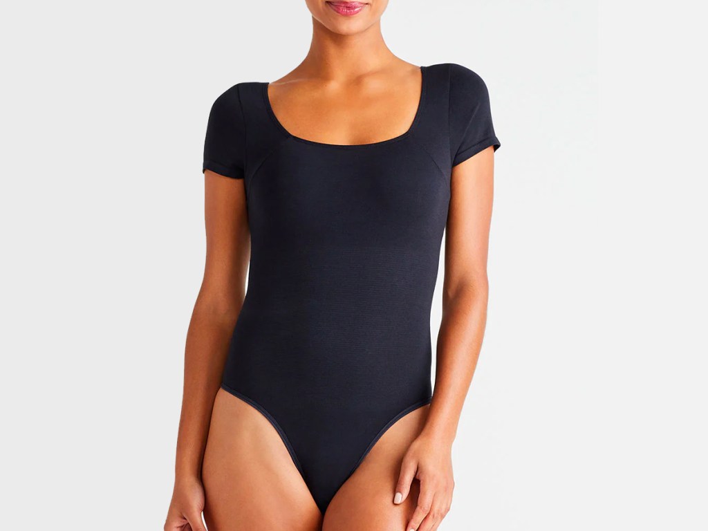 woman wearing black bodysuit