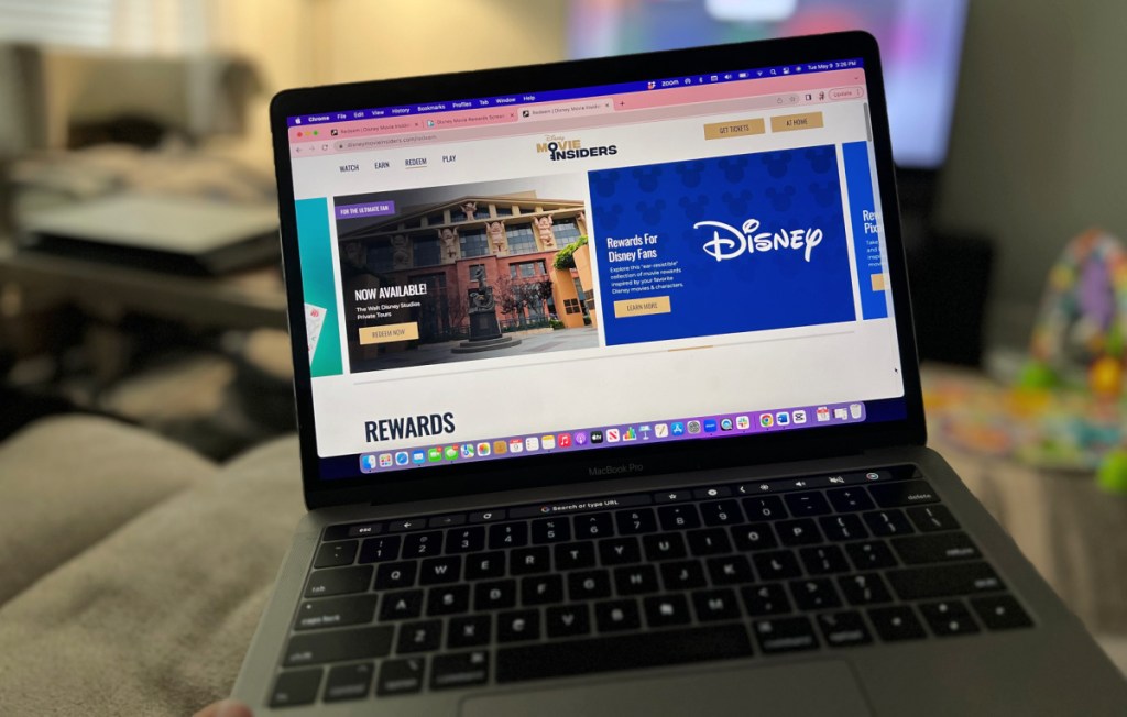 laptop screen displaying the disney movie insiders reward website