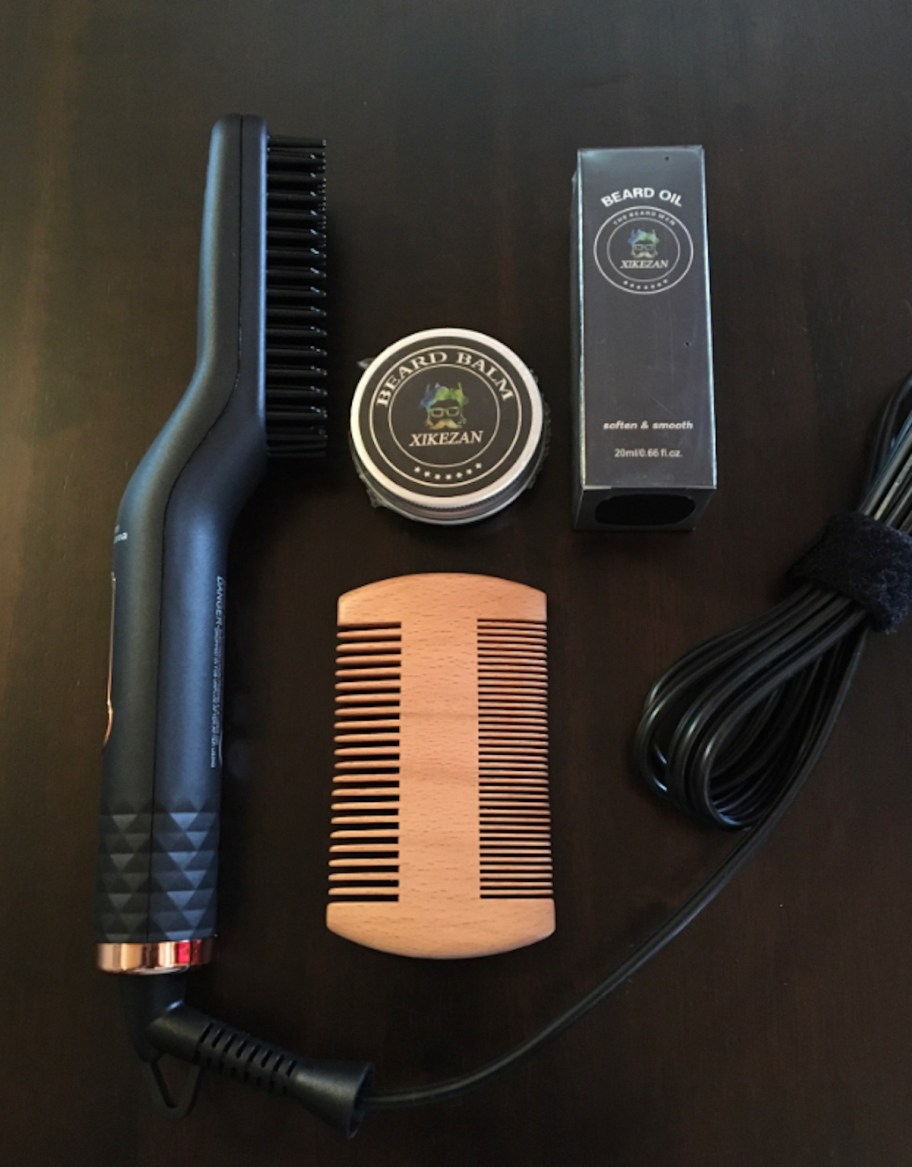 electric beard brush set on table