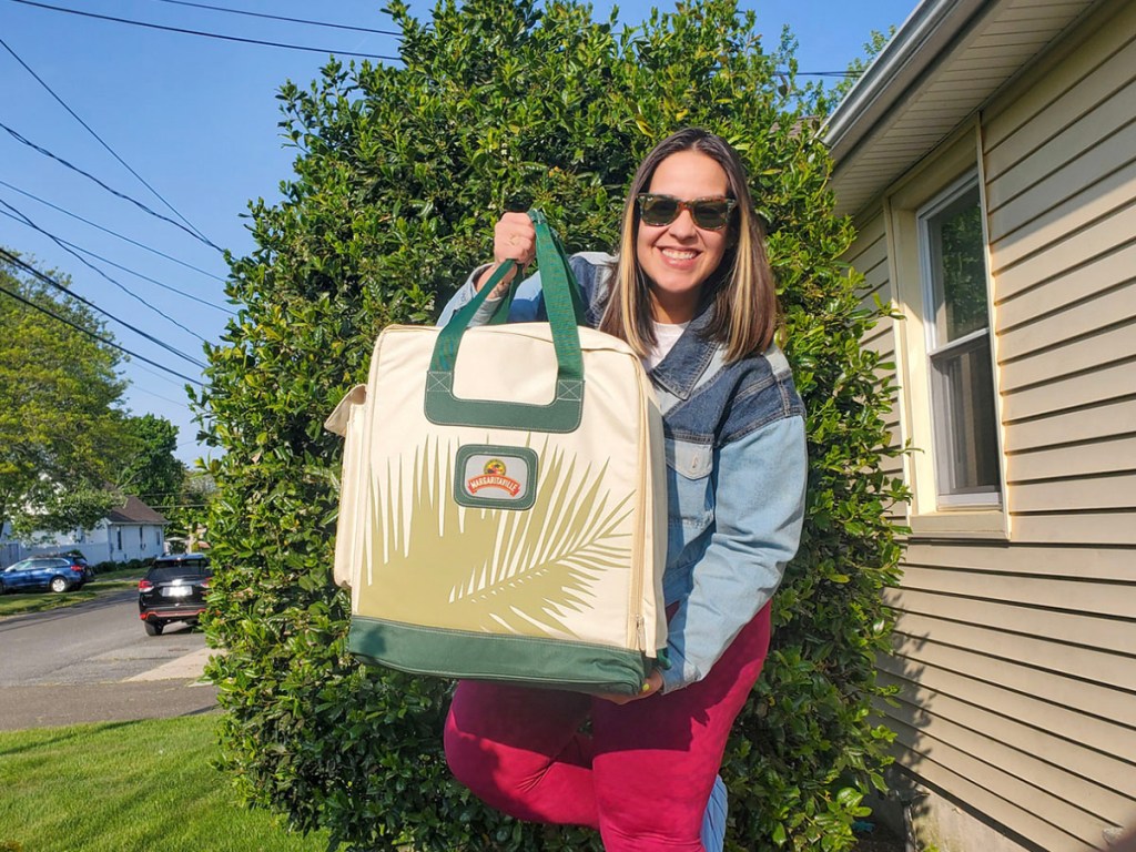 woman holding margaritaville bag 