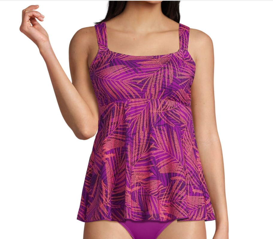 woman in maroon and purple tropical print tankini swim top