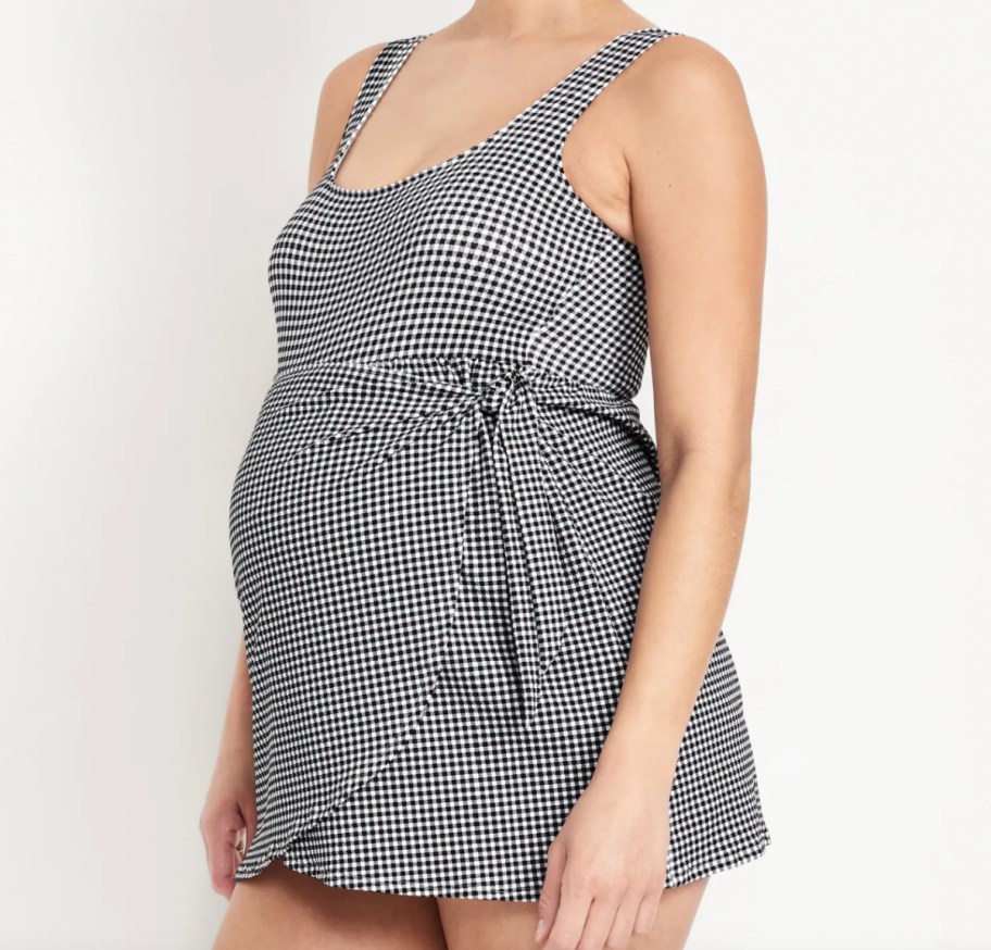 woman in black and white gingham print swimsuit